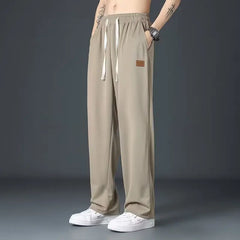 Casual long pants for boys, ice silk quick drying pants for spring and summer, thin, trendy brand straight tube, loose, hanging